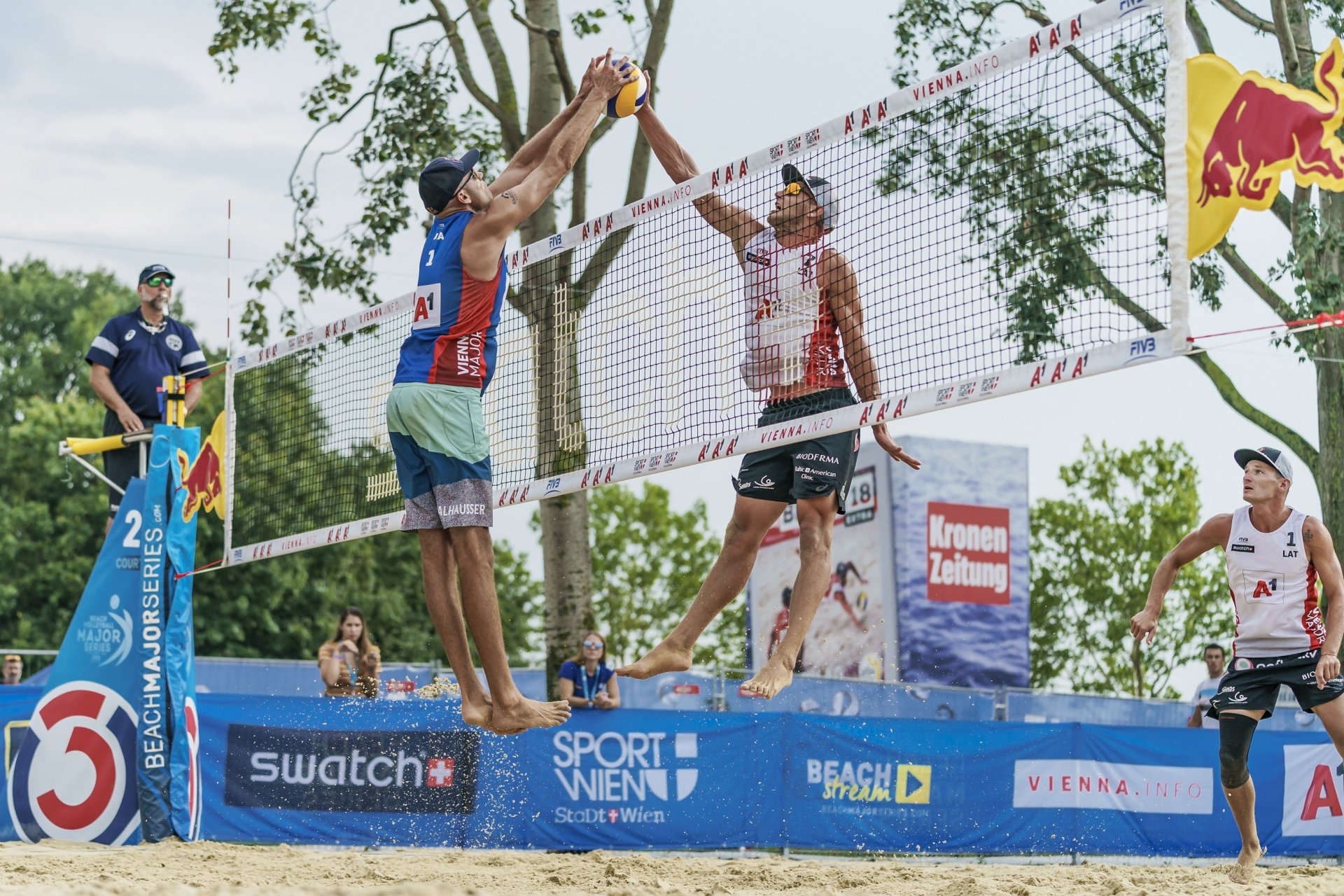 Tocs battles with Dalhausser at the net